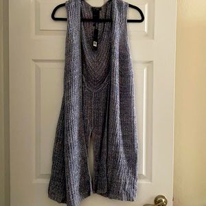 Sleeveless knee length spring sweater